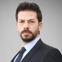 Ahmet Tansu Taşanlar as Nazım Peker